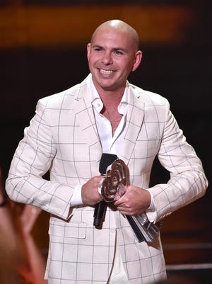 In addition to his Friday night show at US Airways Center, Pitbull will play an invite-only concert at the Venue of Scottsdale.