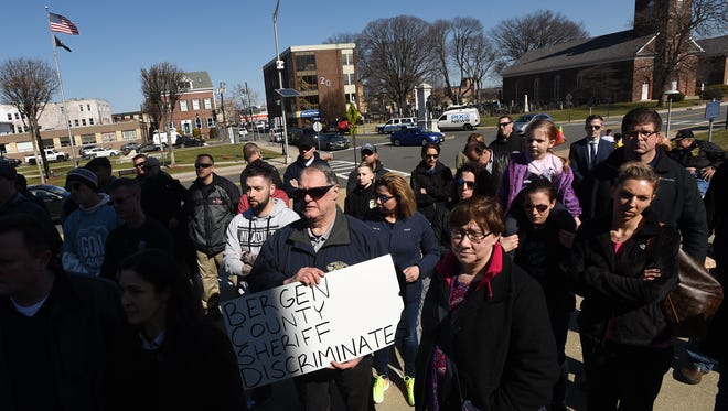 The Bergen County PBA Local 49 and the Gay Officers Action League rally outside the Bergen County Courthouse on Tuesday February 27, 2018 in support of Andrew Kara, a former county police officer who is now suing the sheriff, prosecutor and county over claims he was sexually harassed by other officers because he is gay.