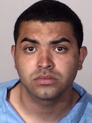 Rafael Alvarado, 19, of Oxnard, was arrested Friday evening on suspicion of several firearm charges, including possession of a loaded firearm.