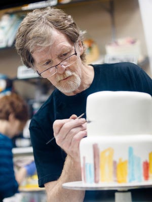 Jack Phillips, owner of Masterpiece Cakeshop in Lakewood, Colo., decorates a cake for a client on Sept. 21, 2017. Phillips refused to bake a cake for a same-sex couple in 2012, and is now awaiting a U.S. Supreme Court ruling after the Colorado Civil Rights Commission's ruling that he bake cakes for same-sex couples or not bake wedding cakes altogether.