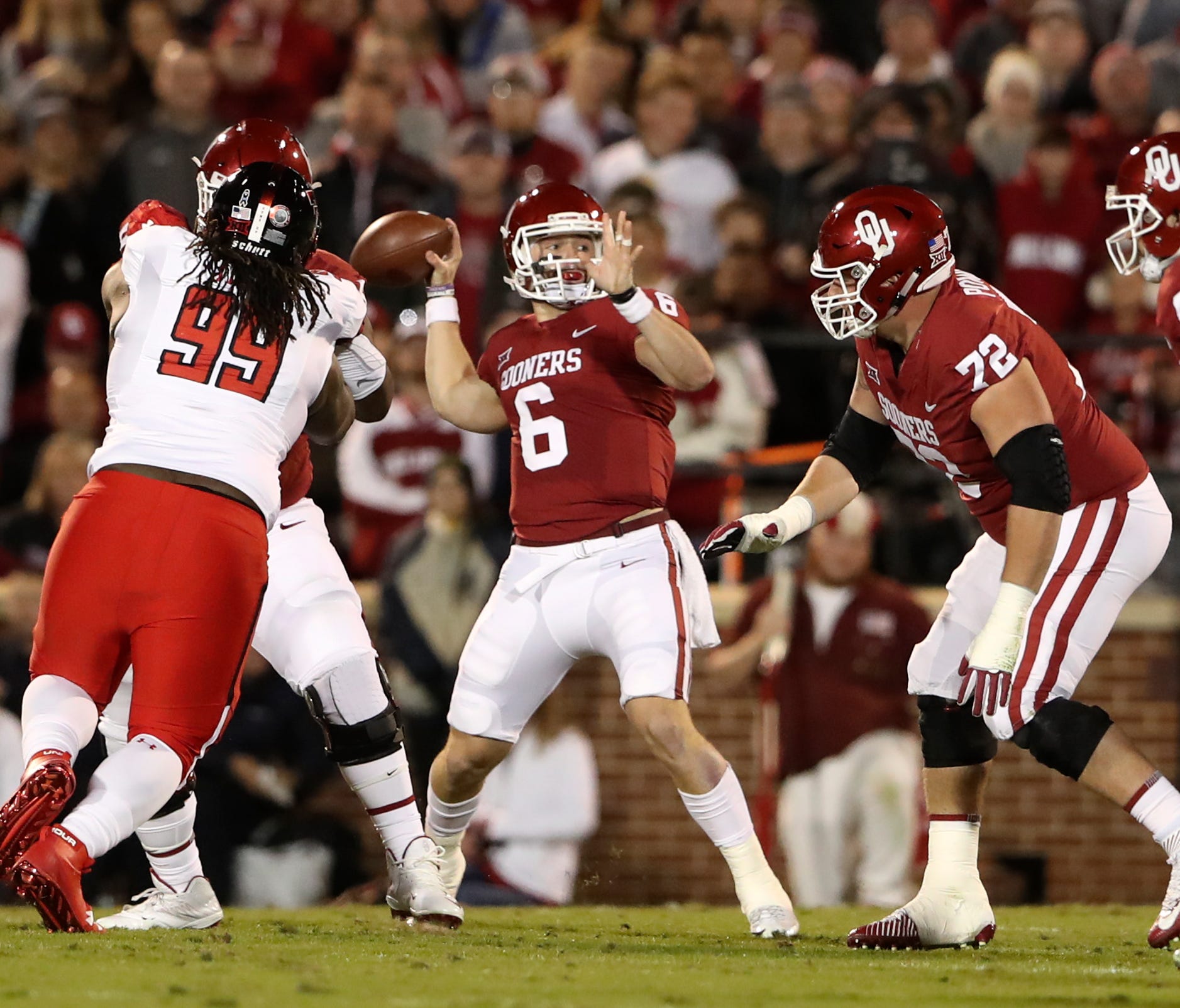 Oklahoma quarterback Baker Mayfield throws during the first quarter against Texas Tech.