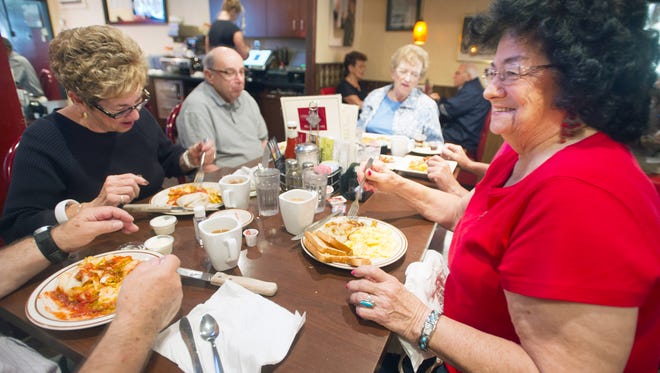 The Reliance Cafe, pictured here with customers eating breakfast in 2013, closed in October 2017 as the owners look to retire.