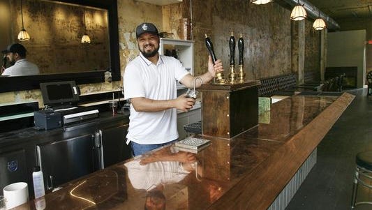 Sam Short of the Potent Potables Project at The Creole, a bar and restaurant in Old Town.  The Creole will become The Creole Burger Bar and Southern Kitchen.