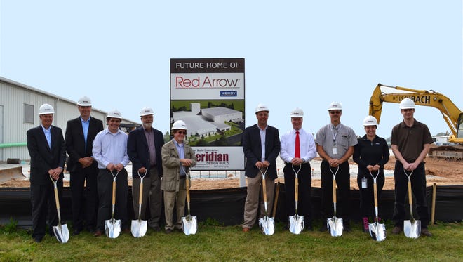 Red Arrow Products has broken ground on a 100,000-square-foot Global Center of Excellence for Smoke and Grill Technology on the former Foster Needle Company site. Pictured, from left, are: Daryl Adel, business unit president, Meat Systems & Flavors; Mark Crass, general manager/vice president; Justin Plutz, director of manufacturing; Robert Suennen, president/architect, OTA; Howard Baskin, director of Facilities & the Workplace; Ray Callahan, vice president of operations; Justin Nickels, Manitowoc mayor; Andrew Shavlik, plant manager; Lauren Hurley, production manager; and Jeff Keehan, process engineer.