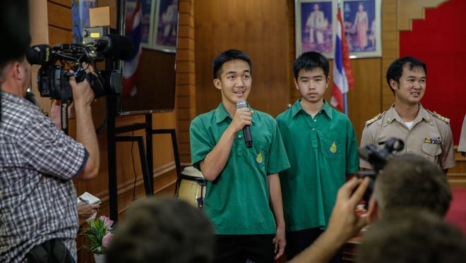 A classmate of the Wild Boars soccer team talks to the press about his hopes for the group's safe return at the Maisaiprasitart School on July 9, 2018 in Chiang Rai, Thailand.
