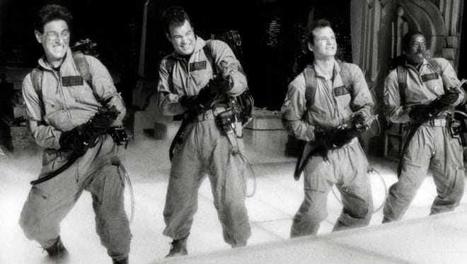 Decked out as cosmic crusaders and ready to do battle with New York City's vaporous villains are Harold Ramis, Dan Aykroyd, Bill Murray and Ernie Hudson in Columbia Pictures new comedy " GHOSTBUSTERS" produced and directed by Ivan Reitman from an original screenplay by Aykroyd and Ramis. Sigourney Weaver and Rick Moranis also star.