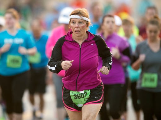 Kathy Givens runs in the half marathon of the Knoxville