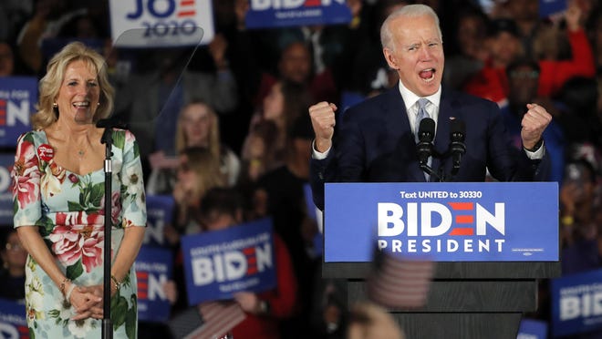 Democratic presidential candidate former Vice President Joe Biden, accompanied by his wife Jill Biden, speaks at a primary night election rally in Columbia, S.C., Saturday, Feb. 29, 2020. (AP Photo/Gerald Herbert)