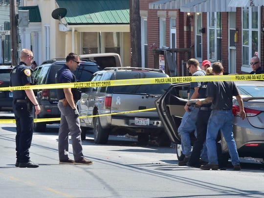 Chambersburg police in July investigate a drive-by shooting on South Franklin Street.