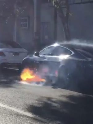 Actor Mary McCormack has shared video of her husband’s Tesla car shooting flames while in Southern California traffic.