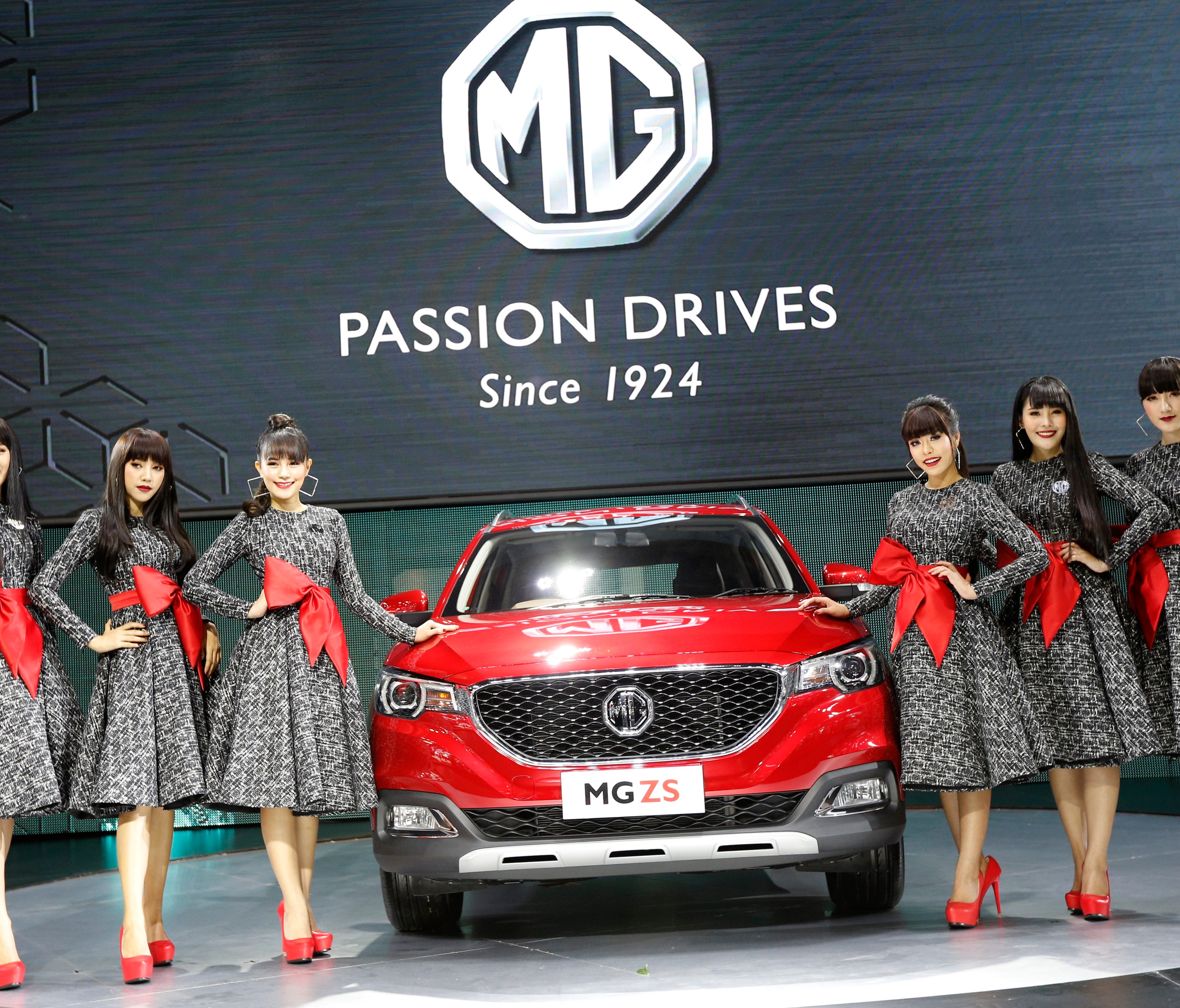Thai models present the MG ZS car during the 34th Thailand International Motor Expo 2017 in Bangkok last October