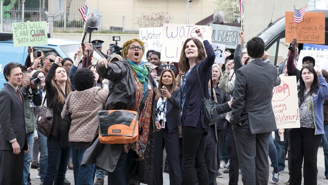 Jill Scott, left, and Bay City native Betsy Brandt, right, play two of the women protesting toxic water in the Lifetime movie “Flint.”