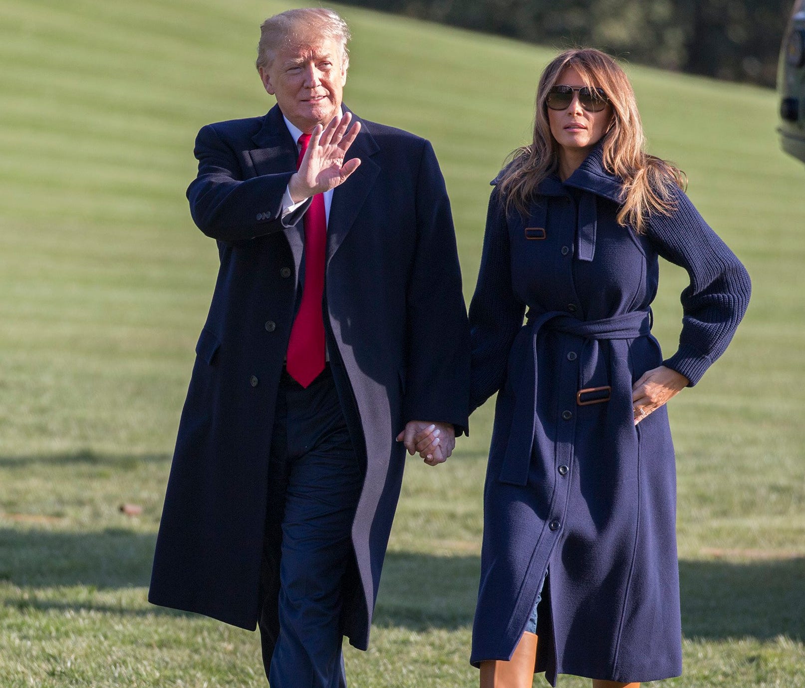 President Trump and first lady Melania Trump return to White House March 19, 2018, after attending an event on fighting the opioid crisis in Manchester, N.H.