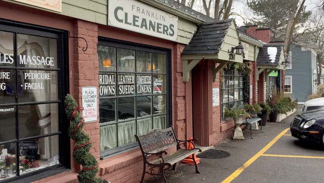 State officials ordered these shops in Oakland County’s upscale Franklin village evacuated Tuesday, March 6, 2018 after tests showed toxic fumes were seeping into the buildings from an old tank of solvent under a floor.