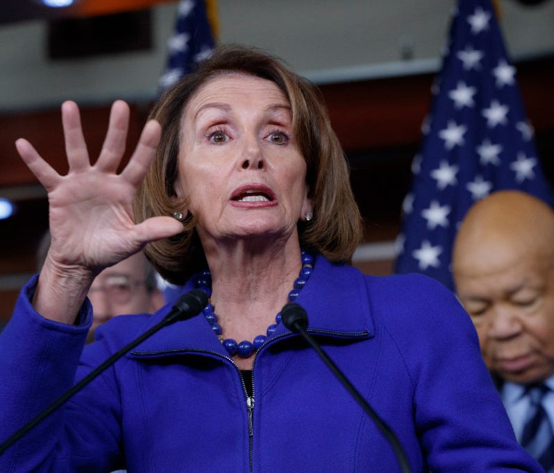 House Minority Leader Nancy Pelosi of Calif., joined at right by Rep. Elijah Cummings, D-Md., ranking member of the House Oversight and Government Reform Committee, speaks during a news conference on Capitol Hill in Washington, Tuesday, Feb. 14, 2017