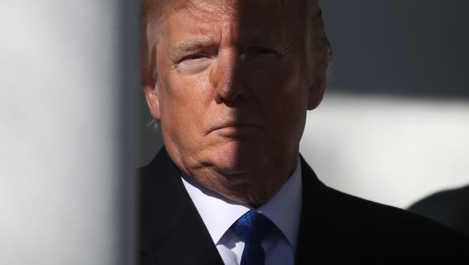 U.S. President Donald Trump stands in the colonnade as he is introduced to speak to March for Life participants and pro-life leaders in the Rose Garden at the White House on January 19, 2018 in Washington, DC. The annual march takes place around the anniversary of Roe v. Wade, Supreme Court decision that came on January 22, 1974.