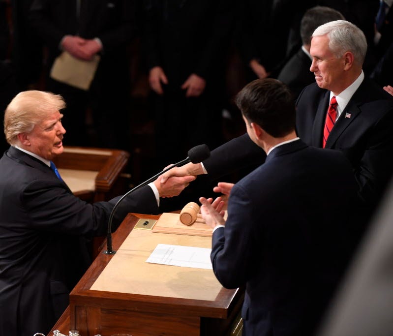 President Trump greets Vice President Pence before delivering the State of the Union Address on Jan. 30, 2018.