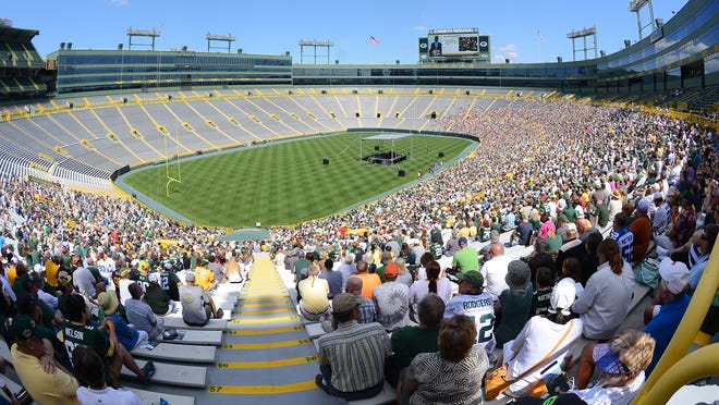 
Green Bay Packers shareholders listen as president Mark Murphy addresses them from the stage inside Lambeau Field during Thursday’s annual shareholders meeting.
