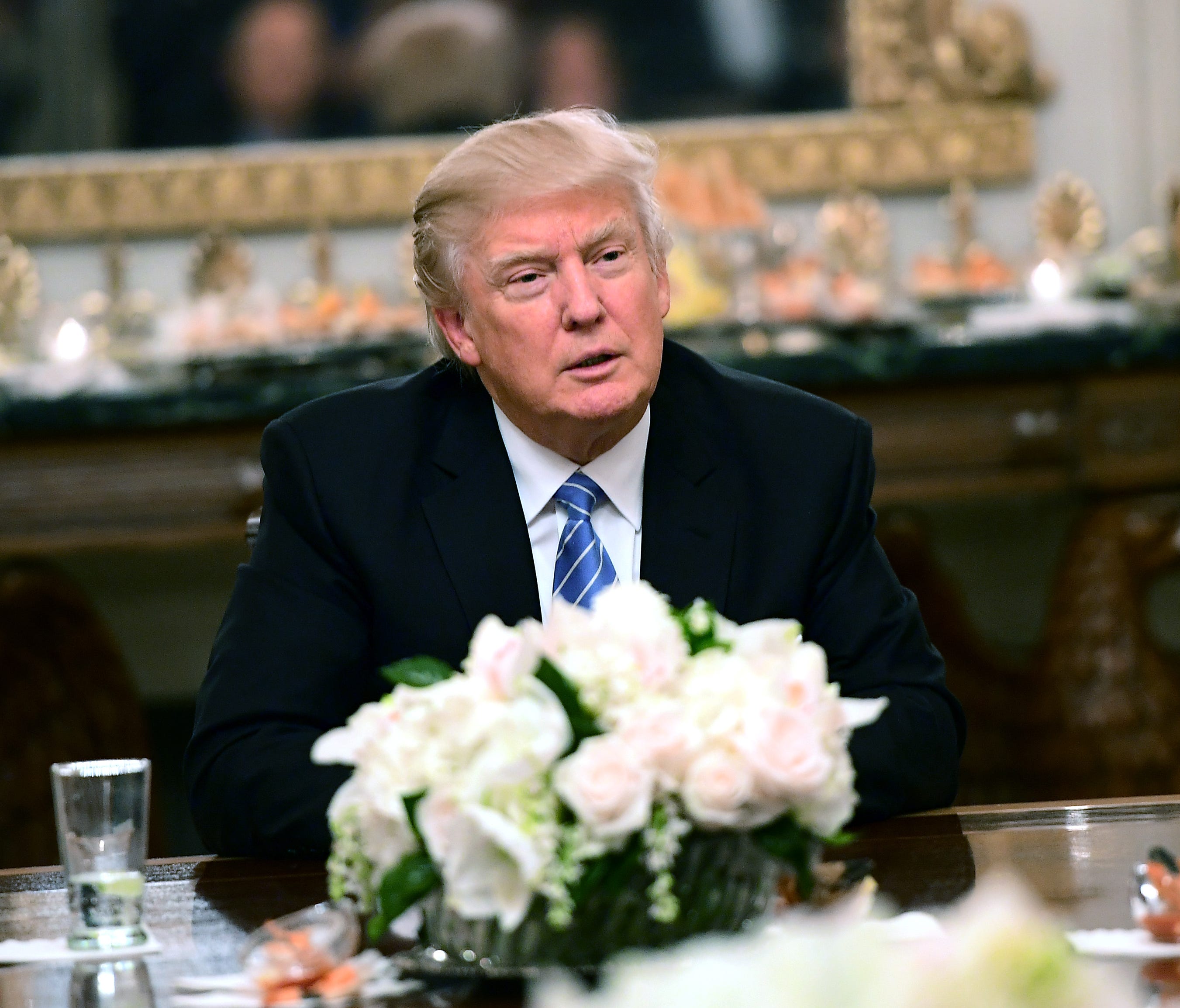 President Trump hosts a reception for House and Senate Republican and Democratic leaders in the State Dining Room of the White House on Monday.