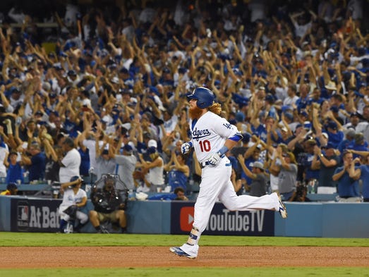 Game 1 at Dodger Stadium: Justin Turner rounds the