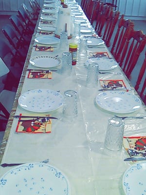 A total of 25 enjoyed a traditional Thanksgiving dinner together at this long table.