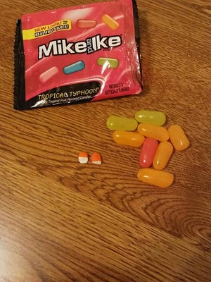 A woman reported to Fond du Lac police that she found a broken pill inside a package of Mike and Ike candy that was acquired while her kids were trick-or-treating Sunday along Park Ave. in Fond du Lac.