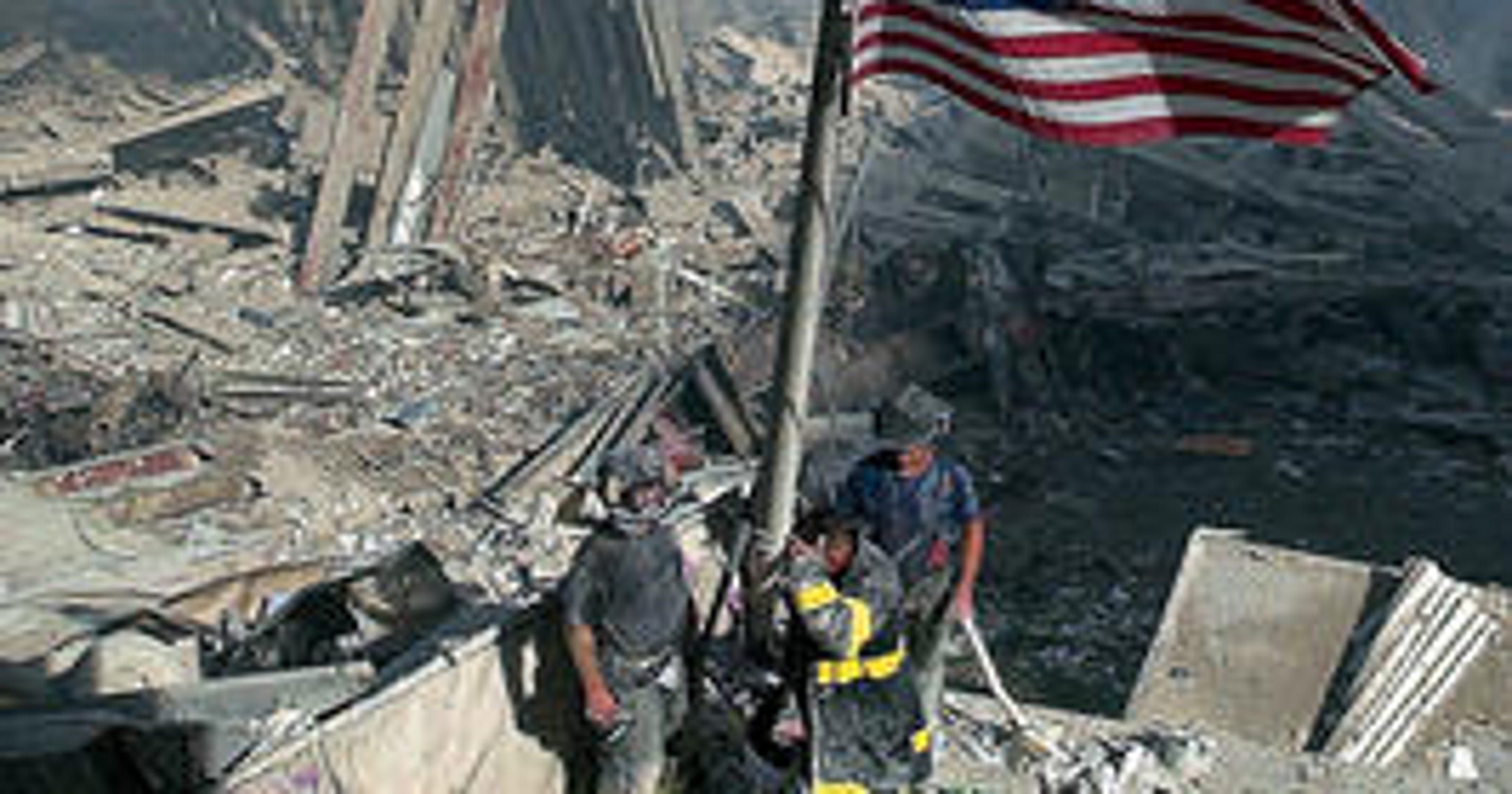 9/11 anniversary: Flag raised at ground zero in iconic image found