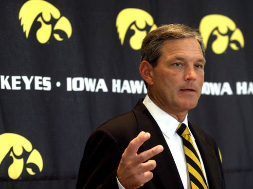 Iowa head coach Kirk Ferentz answers reporters questions during a press conference at the University of Iowa Football Media Day Monday, August 6, 2007, in Iowa City, Iowa.