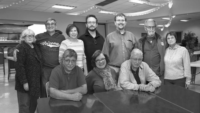 The Fond du Lac Community Christmas Dinner Leadership Team, from left (Back row): Bonnie Burroughs-Bachhuber, Phil Bachhuber, Louann Fauska, Bruce Fauska, Mike Kalsbeach (representing the Eagles), Roger Funk and Marie Funk. Front row, from left: Michael Turk, Nancy Elliman and Todd Culver.
