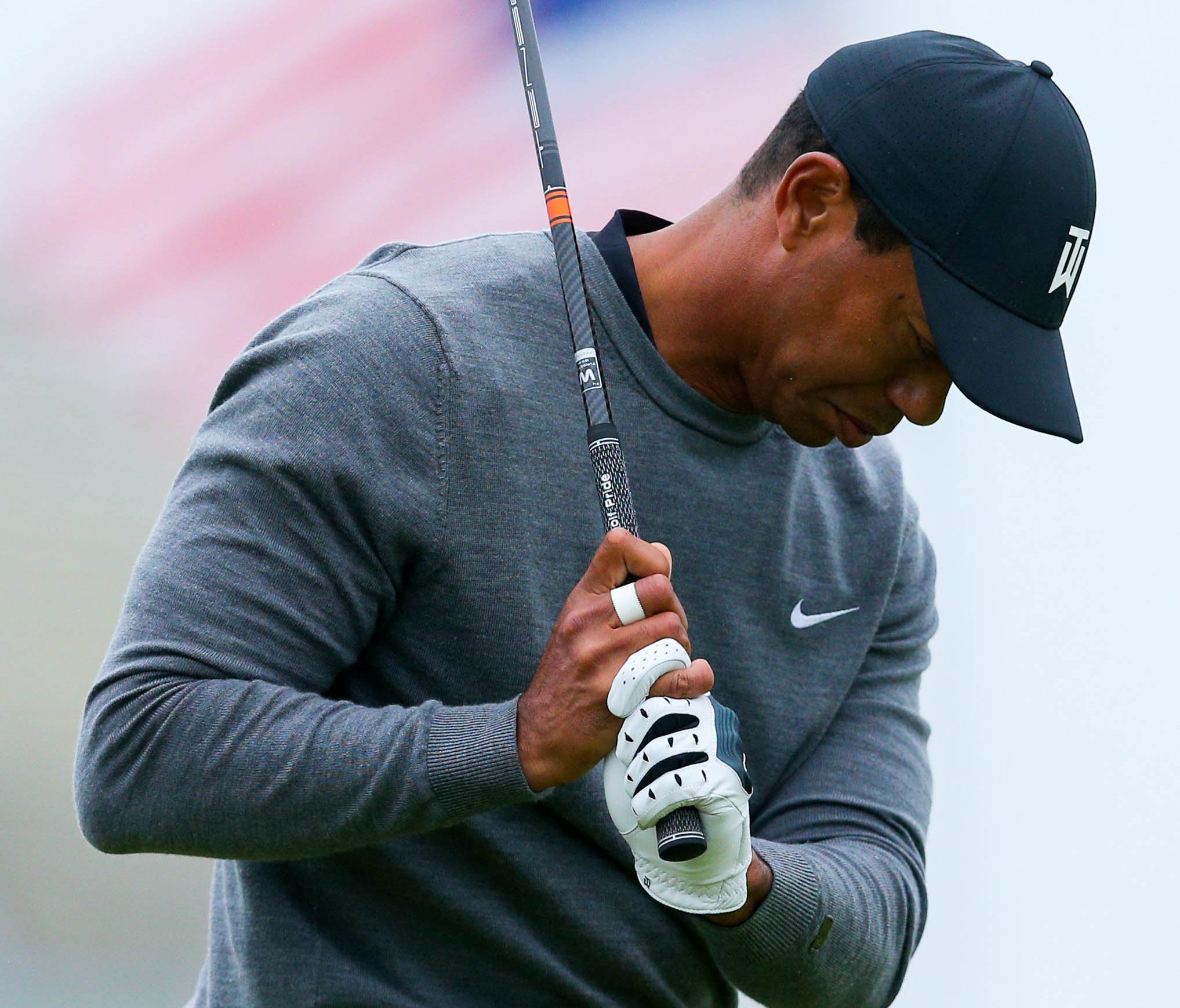 Tiger Woods reacts after he tees off the fourteenth hole during the second round of the U.S. Open golf tournament at Shinnecock Hills.