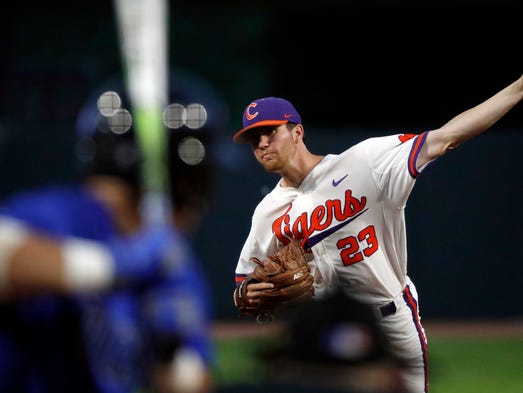 Clemson pitcher Charlie Barnes (23) throws to a Duke