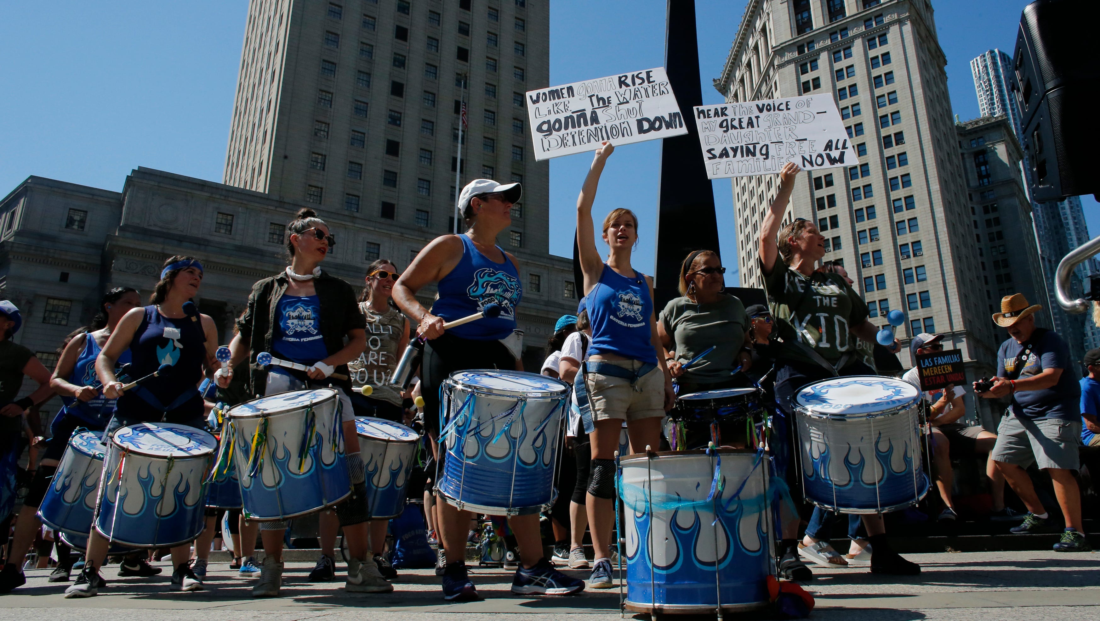 People gather in Foley square as they attend the Families