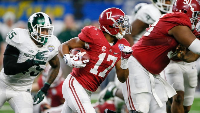 Alabama RB Kenyan Drake runs for yards late in the game against Michigan State during the Goodyear Cotton Bowl Classic in Arlington, Texas on Thursday, Dec. 31, 2015.