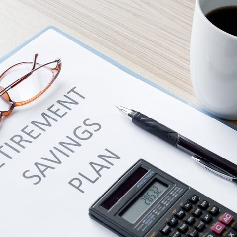 Binder labeled retirement savings calculator.