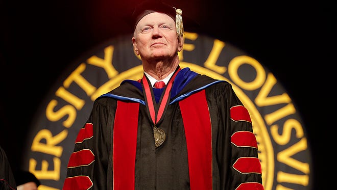 University of Louisville president Dr. James Ramsey stands on the podium as the graduating students come into the arena at the KFC Yum! Center. December 18, 2014