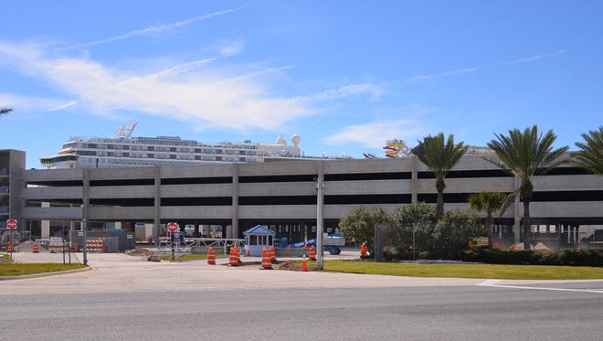 Port Canaveral commissioners on Wednesday approved additional work at the new  parking garage at Cruise Terminal 5.