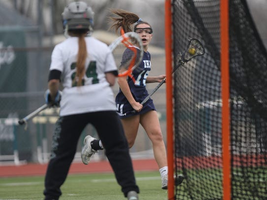 MaryPat Sayre, of IHA, eyes the goal at Ramapo, Thursday,