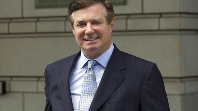 FILE - In this May 23, 2018, file photo, Paul Manafort, President Donald Trump's former campaign chairman, leaves the Federal District Court after a hearing, in Washington. Special counsel Robert Mueller is accusing Manafort of lying to federal investigators in the Russia probe in breach of his plea agreement. Prosecutors say in a new court filing that after Manafort agreed to truthfully cooperate with the investigation, he âcommitted federal crimesâ by lying about âa variety of subject matters.â (AP Photo/Jose Luis Magana, File)