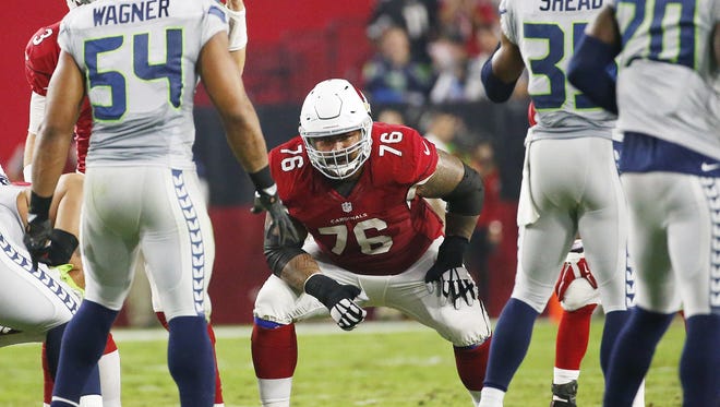 Mike Iupati has agreed to a pay cut with the Cardinals.