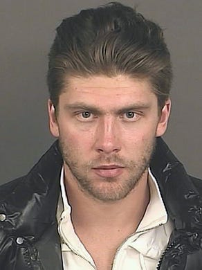 Colorado Avalanche goalie Semyon Varlamov was arrested Oct. 30, 2013, on charges of kidnapping and third-degree assault in what authorities are calling a domestic violence incident with his girlfriend.