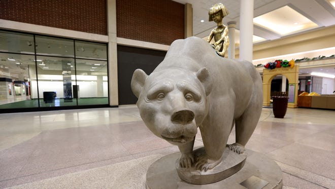 Marshall Fredericks' sculpture "The Boy and Bear" at Northland Center in March 2015.