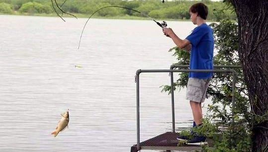 In this 2016 file photo, A.J. Howell reels in a fish during the that year's Mark Howell Memorial Fishing Rodeo at Lake Arrowhead. This year's event will be Saturday, June 2, at Lake Arrowhead.
