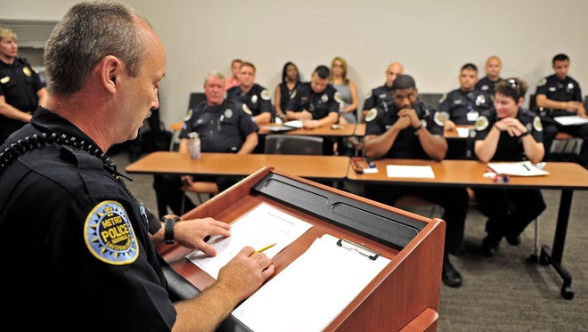 Day Shift Lt. Steve Lewis leads the first roll call at the Midtown Hills Precinct in Nashville.