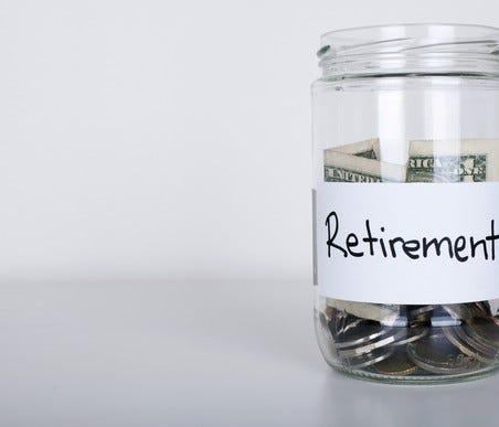 Jar of money labeled retirement.