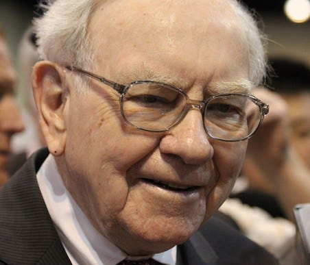 Warren Buffett speaking to reporters.