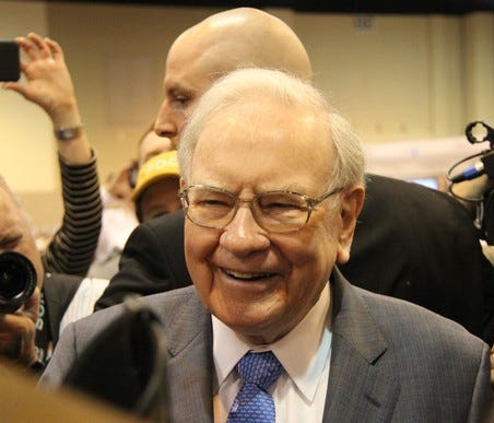 Warren Buffett speaking to reporters.
