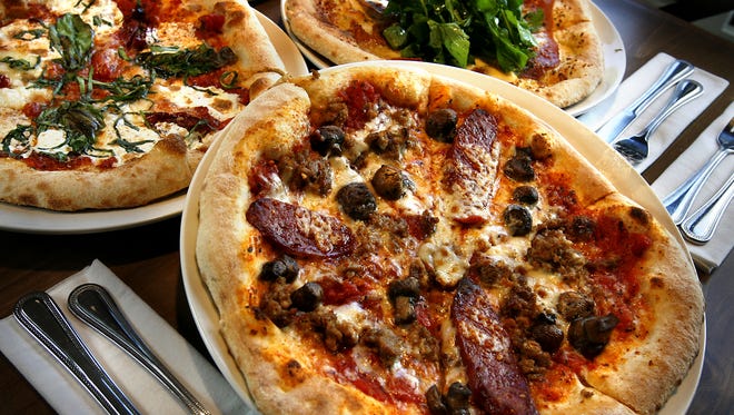 Pizzas hot from the oven at Napolese restaurant in Downtown Indianapolis.