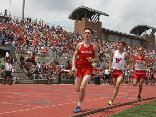 Indian Hill's Johnny Giroux races in the 4x800 meter