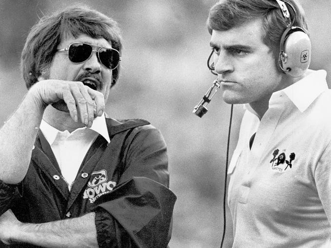 Dan McCarney, right, served as an assistant coach under