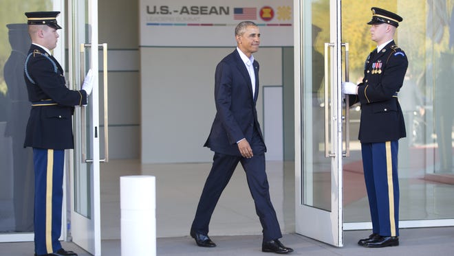 President Barack Obama walks out to greet leaders of ASEAN, the 10-nation Association of Southeast Asian Nations, at the Annenberg Retreat at Sunnylands in Rancho Mirage, Calif., Monday, Feb. 15, 2016. Obama and the leaders of the Southeast Asian nations are gathering for two days of talks on economic and security issues and on forging deeper ties amid China's assertive presence in the region.